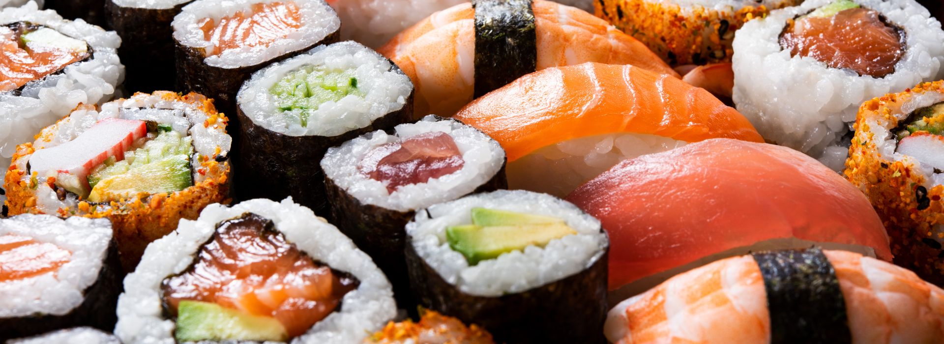 different kinds of sushi rolls with rice and seaweed