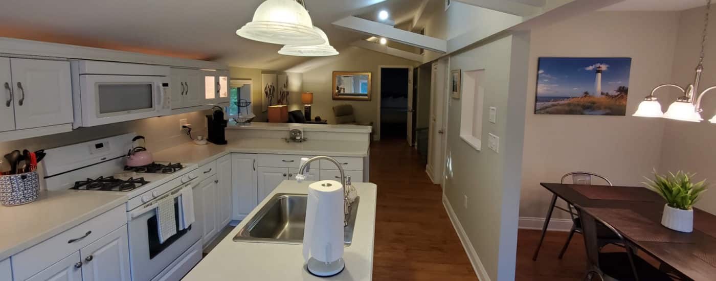 wood floors white kitchen cabinets