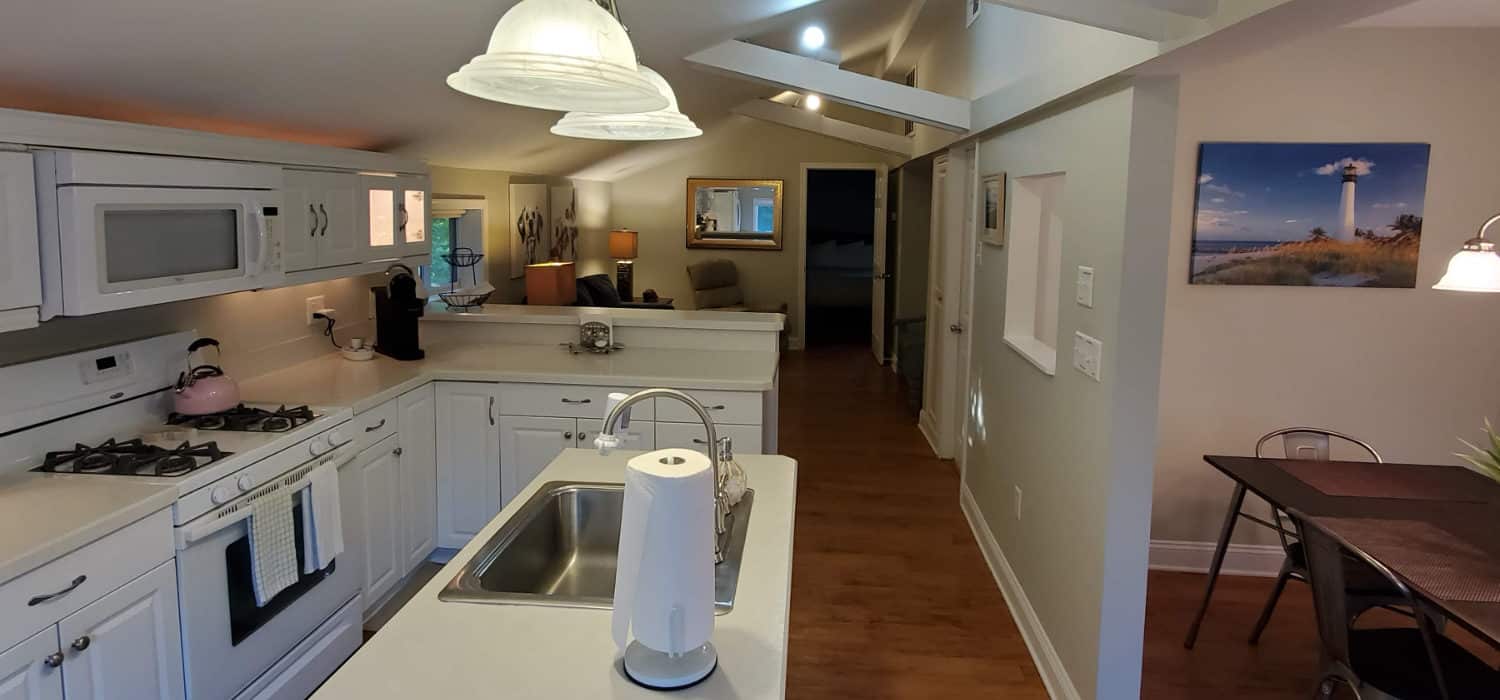 wood floors white kitchen cabinets