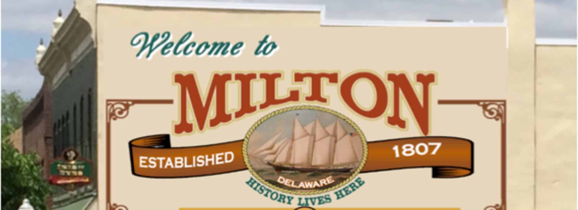 Milton sign on side of building