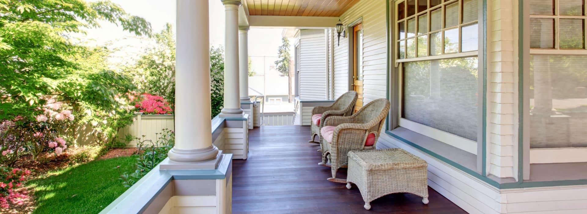Front porch with wicker chairs during the summer time