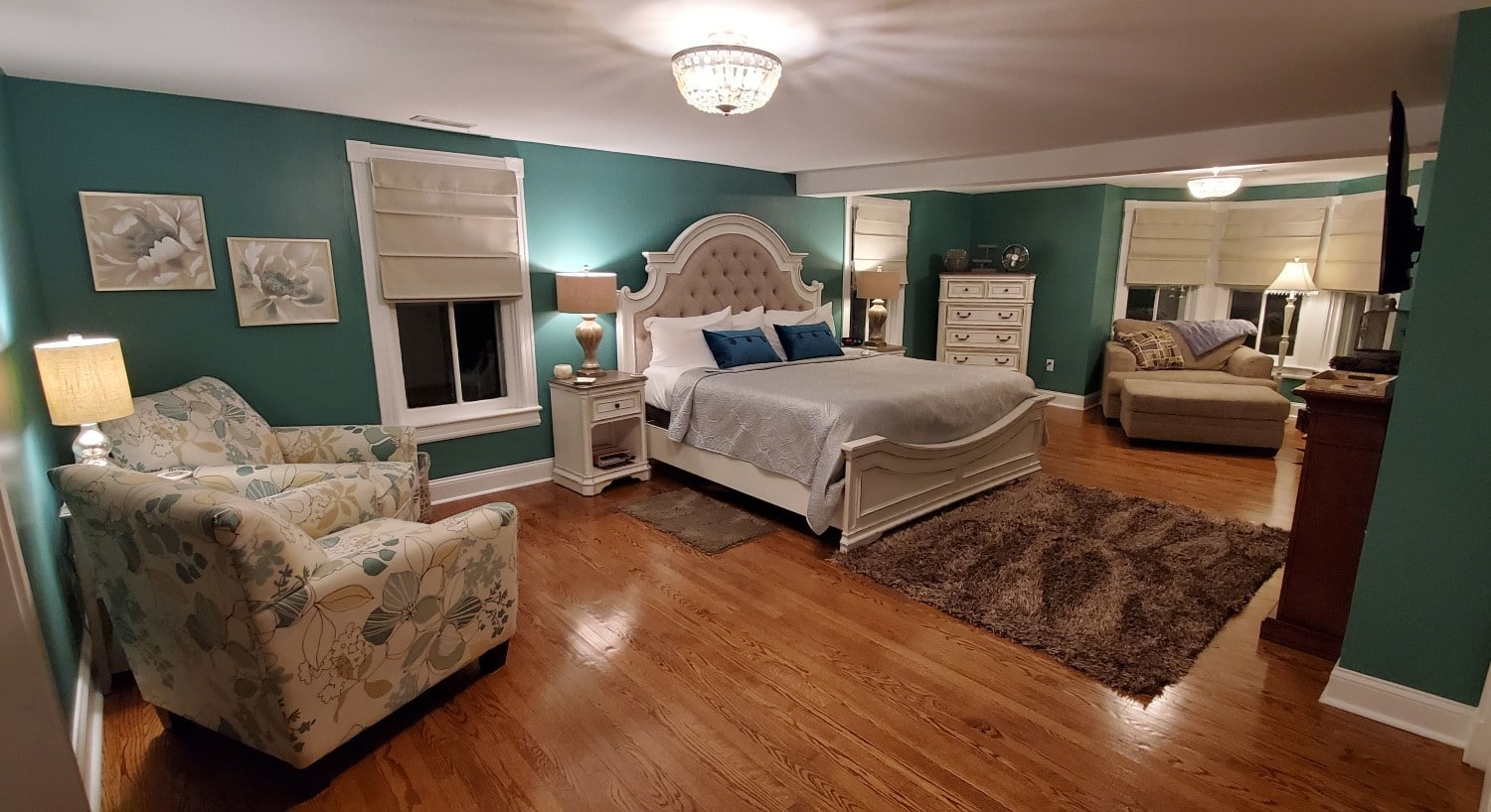robbins room with blue green walls and walnut hardwood floors