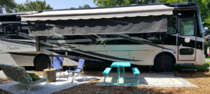 Black and silver MOtorhome outside view